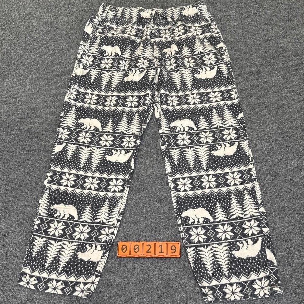 Black & white snowflake and bear patterned pants with elastic waistband. Large.